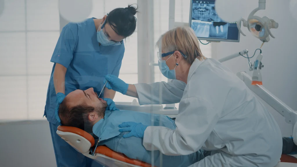 7 Powerful Reasons Why Global Dental Collaboration Matters Today Dentists performing hands-on training — global dental collaboration in action